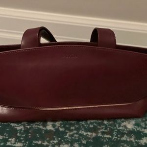 Furla burgundy under arm clutch